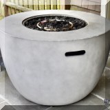L02. Propane firepit. 